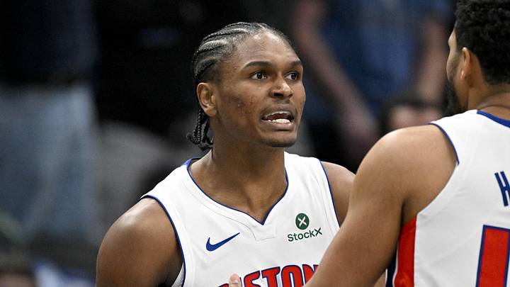 Dec 18, 2025; Dallas, Texas, USA; Detroit Pistons guard Ausar Thompson (9) is restrained by forward Tobias Harris (12) as Thompson reacts to being thrown out of the game against the Dallas Mavericks by NBA referee John Goble (not pictured) during the second quarter at the American Airlines Center. Mandatory Credit: Jerome Miron-Imagn Images Dec 18, 2025; Dallas, Texas, USA; Detroit Pistons guard Ausar Thompson (9) is restrained by forward Tobias Harris (12) as Thompson reacts to being thrown out of the game against the Dallas Mavericks by NBA referee John Goble (not pictured) during the second quarter at the American Airlines Center. Mandatory Credit: Jerome Miron-Imagn Images