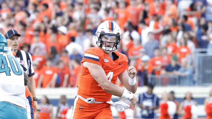 Aug 30, 2025; Charlottesville, Virginia, USA; Virginia Cavaliers quarterback Chandler Morris (4) throws the ball to Cavaliers wide receiver Jahmal Edrine (7) during the second quarter against the Coastal Carolina Chanticleers at Scott Stadium. Mandatory Credit: Amber Searls-Imagn Images Aug 30, 2025; Charlottesville, Virginia, USA; Virginia Cavaliers quarterback Chandler Morris (4) throws the ball to Cavaliers wide receiver Jahmal Edrine (7) during the second quarter against the Coastal Carolina Chanticleers at Scott Stadium. Mandatory Credit: Amber Searls-Imagn Images
