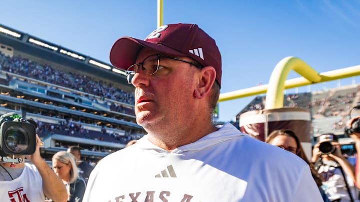 Nov 22, 2025; College Station, Texas, USA; Texas A&M Aggies head coach Mike Elko walks off the field after defeating the Samford Bulldogs 48-0 in a game at Kyle Field. Mandatory Credit: Joseph Buvid-Imagn Images