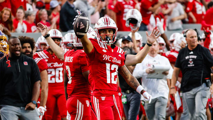 Aug 28, 2025; Raleigh, North Carolina, USA; North Carolina State Wolfpack wide receiver Teddy Hoffmann (12) celebrates a down during the first half of the game against East Carolina Pirates at Carter-Finley Stadium. Mandatory Credit: Jaylynn Nash-Imagn Images Aug 28, 2025; Raleigh, North Carolina, USA; North Carolina State Wolfpack wide receiver Teddy Hoffmann (12) celebrates a down during the first half of the game against East Carolina Pirates at Carter-Finley Stadium. Mandatory Credit: Jaylynn Nash-Imagn Images