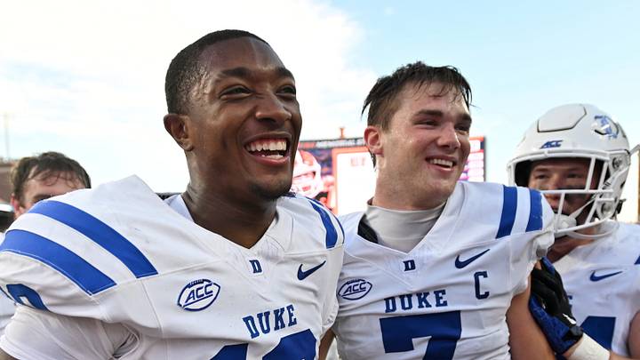 Sep 12, 2026; Champaign, Illinois, USA; Duke Blue Devils defensive end Tyshon Reed Jr. (10) and linebacker Nick Morris Jr. (7) celebrate a 31-27 win over the Illinois Fighting Illini at Gies Memorial Stadium. Mandatory Credit: Ron Johnson-Imagn Images Sep 12, 2026; Champaign, Illinois, USA; Duke Blue Devils defensive end Tyshon Reed Jr. (10) and linebacker Nick Morris Jr. (7) celebrate a 31-27 win over the Illinois Fighting Illini at Gies Memorial Stadium. Mandatory Credit: Ron Johnson-Imagn Images