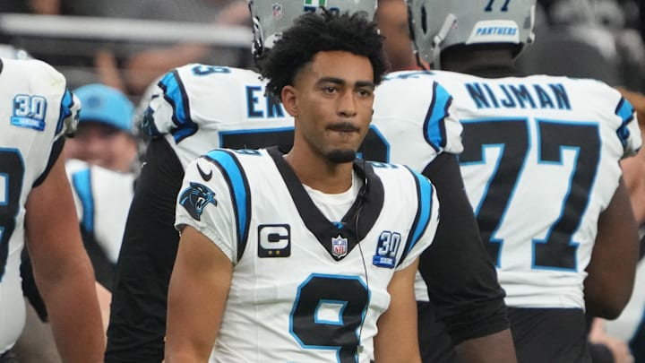 Sep 22, 2024; Paradise, Nevada, USA; Carolina Panthers quarterback Bryce Young (9) watches from the sidelines against the Las Vegas Raiders in the second half at Allegiant Stadium. Mandatory Credit: Kirby Lee-Imagn Images