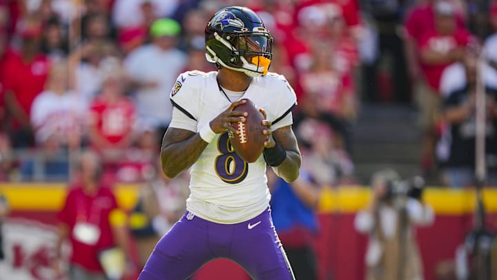 Sep 28, 2025; Kansas City, Missouri, USA; Baltimore Ravens quarterback Lamar Jackson (8) drops back to pass during the first half against the Kansas City Chiefs at GEHA Field at Arrowhead Stadium. Mandatory Credit: Jay Biggerstaff-Imagn Images