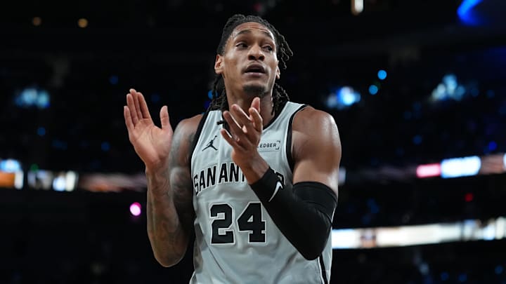 Dec 13, 2025; Las Vegas, Nevada, USA; San Antonio Spurs guard Devin Vassell (24) reacts during the second quarter against the Oklahoma City Thunder at T-Mobile Arena. Dec 13, 2025; Las Vegas, Nevada, USA; San Antonio Spurs guard Devin Vassell (24) reacts during the second quarter against the Oklahoma City Thunder at T-Mobile Arena.