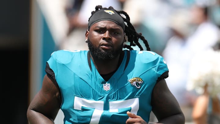 Sep 7, 2025; Jacksonville, Florida, USA; Jacksonville Jaguars offensive tackle Anton Harrison (77) takes the field prior to a game against the Carolina Panthers at EverBank Stadium. Mandatory Credit: Nathan Ray Seebeck-Imagn Images Sep 7, 2025; Jacksonville, Florida, USA; Jacksonville Jaguars offensive tackle Anton Harrison (77) takes the field prior to a game against the Carolina Panthers at EverBank Stadium. Mandatory Credit: Nathan Ray Seebeck-Imagn Images