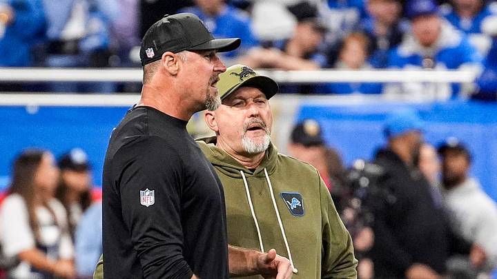 Detroit Lions head coach Dan Campbell talks to former offensive coordinator John Morton at warmup before Vikings game Detroit Lions head coach Dan Campbell talks to former offensive coordinator John Morton at warmup before Vikings game