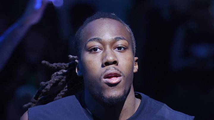 May 10, 2026; Minneapolis, Minnesota, USA; Minnesota Timberwolves guard Ayo Dosunmu (13) walks out during introductions before game four of the second round of the 2026 NBA Playoffs with the San Antonio Spurs at Target Center. Mandatory Credit: Bruce Kluckhohn-Imagn Images