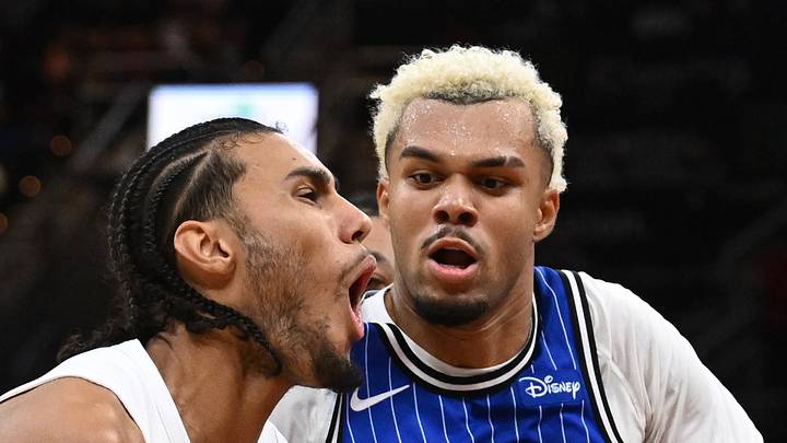 Cleveland Cavaliers guard Jaylon Tyson drives to the basket against Orlando Magic forward Noah Penda. Cleveland Cavaliers guard Jaylon Tyson drives to the basket against Orlando Magic forward Noah Penda.