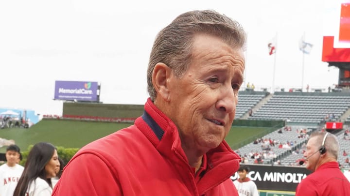 Angels owner Arte Moreno shakes hands with Tim Kepler during the game against the Boston Red Sox  at Angel Stadium on May 24, 2023.