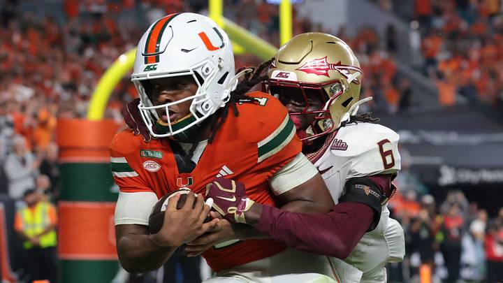 Oct 17, 2026; Miami Gardens, Florida, USA; Miami Hurricanes wide receiver Malachi Toney (1) catches a touchdown against Florida State Seminoles defensive back Ja'Bril Rawls (6) during overtime at Hard Rock Stadium. Mandatory Credit: Sam Navarro-Imagn Images Oct 17, 2026; Miami Gardens, Florida, USA; Miami Hurricanes wide receiver Malachi Toney (1) catches a touchdown against Florida State Seminoles defensive back Ja'Bril Rawls (6) during overtime at Hard Rock Stadium. Mandatory Credit: Sam Navarro-Imagn Images