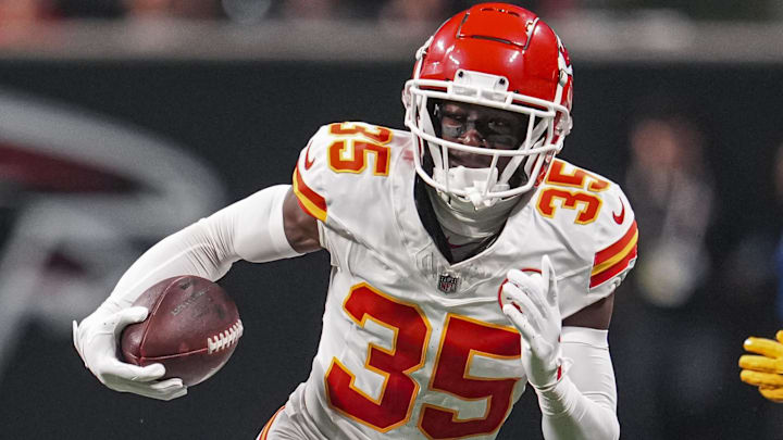 Sep 22, 2024; Atlanta, Georgia, USA; Kansas City Chiefs cornerback Jaylen Watson (35) runs after taking a lateral after an interception against the Atlanta Falcons during the second half at Mercedes-Benz Stadium. Mandatory Credit: Dale Zanine-Imagn Images