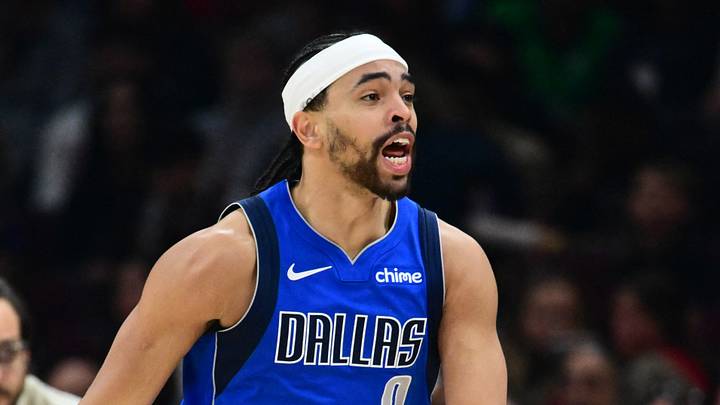 Mar 15, 2026; Cleveland, Ohio, USA; Dallas Mavericks guard Ryan Nembhard (9) celebrates after hitting a three point basket against the Cleveland Cavaliers during the second half at Rocket Arena. Mandatory Credit: Ken Blaze-Imagn Images
