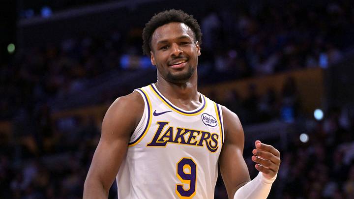 Oct 12, 2025; Los Angeles, California, USA;  Los Angeles Lakers guard Bronny James (9) reacts after a Golden State Warriors basket during the second half at Crypto.com Arena. Mandatory Credit: Jayne Kamin-Oncea-Imagn Images