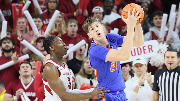 Arkansas Razorbacks forward Adou Thiero (3) defends against Florida Gators forward Alex Condon (21) during the first half at Bud Walton Arena. Arkansas Razorbacks forward Adou Thiero (3) defends against Florida Gators forward Alex Condon (21) during the first half at Bud Walton Arena.
