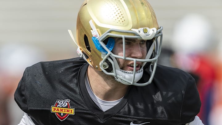 American team linebacker Jack Kiser of Notre Dame (20) works through drills during Senior Bowl practice