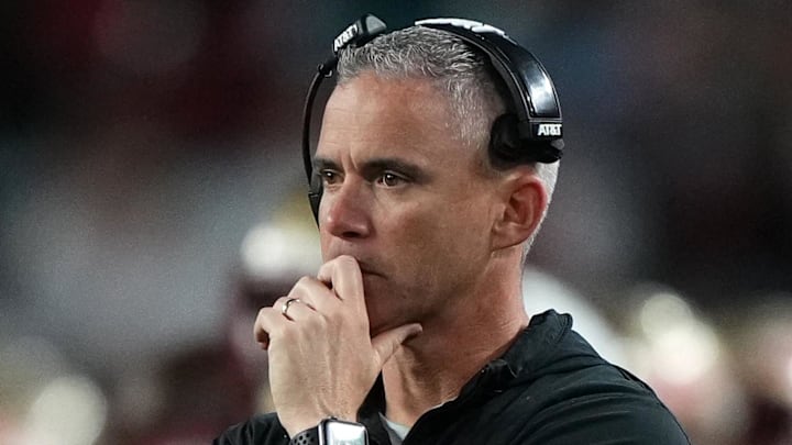 Dec 30, 2023; Miami Gardens, FL, USA; Florida State Seminoles head coach Mike Norvell reacts against the Georgia Bulldogs during the second half in the 2023 Orange Bowl at Hard Rock Stadium. Mandatory Credit: Jasen Vinlove-Imagn Images