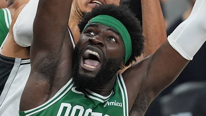 Mar 10, 2026; San Antonio, Texas, USA;  San Antonio Spurs forward Victor Wembanyama (1) shoots the ball against Boston Celtics center Neemias Queta (88) and guard Ron Haper Jr. (13) in the first half at Frost Bank Center. Mandatory Credit: Daniel Dunn-Imagn Images