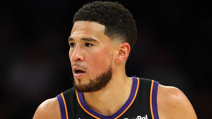 Apr 27, 2026; Phoenix, Arizona, USA; Phoenix Suns guard Devin Booker (1) against the Oklahoma City Thunder during game four of the first round of the 2026 NBA Playoffs at Mortgage Matchup Center. Mandatory Credit: Mark J. Rebilas-Imagn Images