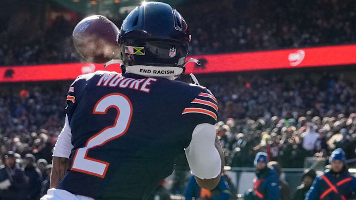 Dec 14, 2025; Chicago, Illinois, USA; Chicago Bears wide receiver DJ Moore (2) catches a pass for a touchdown during the first quarter against the Cleveland Browns at Soldier Field. Dec 14, 2025; Chicago, Illinois, USA; Chicago Bears wide receiver DJ Moore (2) catches a pass for a touchdown during the first quarter against the Cleveland Browns at Soldier Field.
