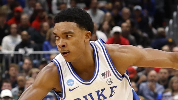 Mar 27, 2026; Washington, DC, USA; Duke Blue Devils guard Caleb Foster (1) dribbles the ball against St. John's Red Storm guard Dylan Darling (0) in the first half during a Sweet Sixteen game of the East Regional of the men's 2026 NCAA Tournament at Capital One Arena. Mandatory Credit: Amber Searls-Imagn Images