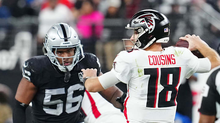 Dec 16, 2024; Paradise, Nevada, USA; Las Vegas Raiders linebacker Amari Burney (56) looks to sack Atlanta Falcons quarterback Kirk Cousins (18) during the third quarter at Allegiant Stadium. Mandatory Credit: Stephen R. Sylvanie-Imagn Images
