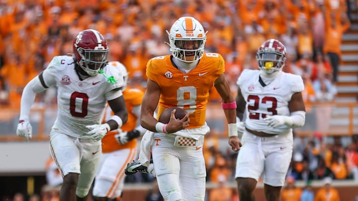 Oct 19, 2024; Knoxville, Tennessee, USA; Tennessee Volunteers quarterback Nico Iamaleava (8) runs the ball against the Alabama Crimson Tide during the second half at Neyland Stadium. Mandatory Credit: Randy Sartin-Imagn Images