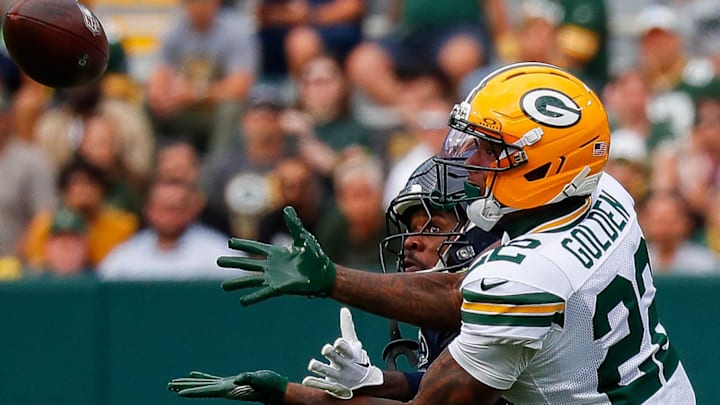 Green Bay Packers wide receiver Matthew Golden (22) catches a pass against Seattle Seahawks cornerback Nehemiah Pritchett. Green Bay Packers wide receiver Matthew Golden (22) catches a pass against Seattle Seahawks cornerback Nehemiah Pritchett.