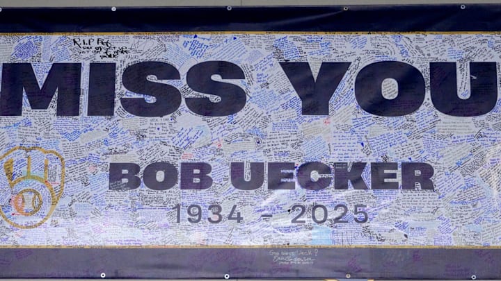 A banner honoring Bob Uecker is filled with signatures outside the press box, before the Milwaukee Brewers home opener against the Kansas City Royals at American Family Field in Milwaukee on Monday, March 31, 2025. - Mike De Sisti / Milwaukee Journal Sentinel