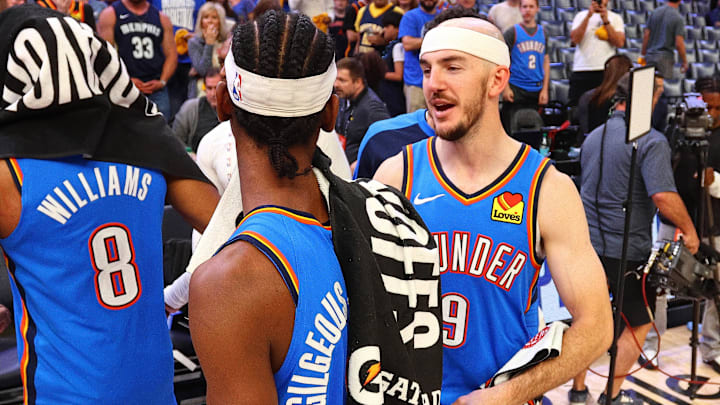 Apr 26, 2025; Memphis, Tennessee, USA; Oklahoma City Thunder guard Alex Caruso (9) and Oklahoma City Thunder guard Shai Gilgeous-Alexander (2) react after defeating the Memphis Grizzlies in game four for the first round of the 2024 NBA Playoffs at FedExForum. Mandatory Credit: Petre Thomas-Imagn Images Apr 26, 2025; Memphis, Tennessee, USA; Oklahoma City Thunder guard Alex Caruso (9) and Oklahoma City Thunder guard Shai Gilgeous-Alexander (2) react after defeating the Memphis Grizzlies in game four for the first round of the 2024 NBA Playoffs at FedExForum. Mandatory Credit: Petre Thomas-Imagn Images