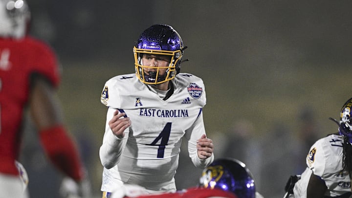 Dec 28, 2024; Annapolis, MD, USA;  East Carolina Pirates quarterback Katin Houser (4) calls a play act the line during first half of the Go Bowling Military Bowl against the North Carolina State Wolfpack at Navy-Marine Corps Memorial Stadium. Mandatory Credit: Tommy Gilligan-Imagn Images