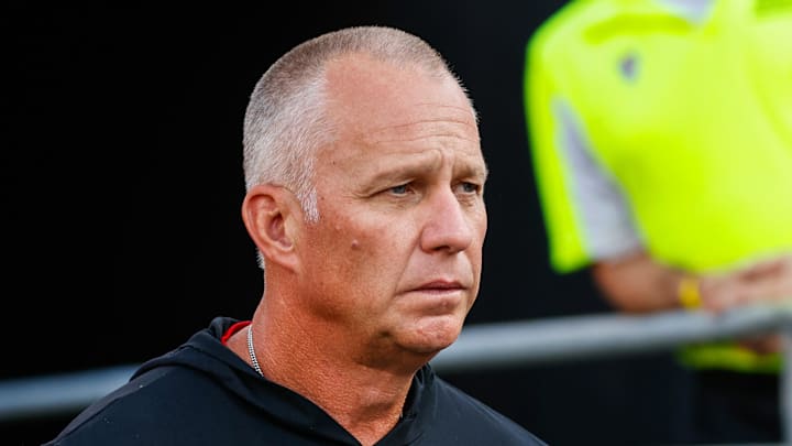 Aug 28, 2025; Raleigh, North Carolina, USA; North Carolina State Wolfpack head coach Dave Doeren walks out during the warmups prior to the game against East Carolina Pirates at Carter-Finley Stadium. Mandatory Credit: Jaylynn Nash-Imagn Images Aug 28, 2025; Raleigh, North Carolina, USA; North Carolina State Wolfpack head coach Dave Doeren walks out during the warmups prior to the game against East Carolina Pirates at Carter-Finley Stadium. Mandatory Credit: Jaylynn Nash-Imagn Images