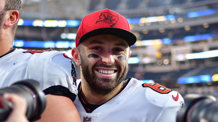 Dec 15, 2024; Inglewood, California, USA; Tampa Bay Buccaneers quarterback Baker Mayfield (6) celebrates the victory against the Los Angeles Chargers at SoFi Stadium. Mandatory Credit: Gary A. Vasquez-Imagn Images