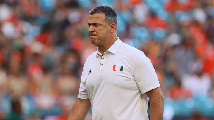 Sep 7, 2024; Miami Gardens, Florida, USA; Miami Hurricanes head coach Mario Cristobal looks on before the game against the Florida A&M Rattlers at Hard Rock Stadium. Mandatory Credit: Sam Navarro-Imagn Images Sep 7, 2024; Miami Gardens, Florida, USA; Miami Hurricanes head coach Mario Cristobal looks on before the game against the Florida A&M Rattlers at Hard Rock Stadium. Mandatory Credit: Sam Navarro-Imagn Images