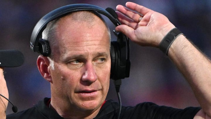 Sep 20, 2025; Durham, North Carolina, USA;  NC State Wolfpack head coach Dave Doeren reacts to a call during the fourth quarter against the Duke Blue Devils at Wallace Wade Stadium. Mandatory Credit: Zachary Taft-Imagn Images