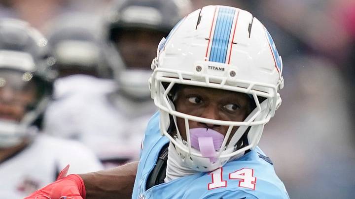 Tennessee Titans wide receiver Carnell Tate (14) runs the ball during the third quarter against the Houston Texans at Nissan Stadium in Nashville, Tenn., Sunday, Oct. 11, 2026. Tennessee Titans wide receiver Carnell Tate (14) runs the ball during the third quarter against the Houston Texans at Nissan Stadium in Nashville, Tenn., Sunday, Oct. 11, 2026.