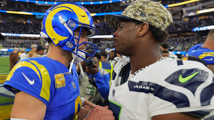 Nov 19, 2023; Inglewood, California, USA; Los Angeles Rams quarterback Matthew Stafford (9) and Seattle Seahawks quarterback Geno Smith (7) shake hands after the game at SoFi Stadium. The Rams defeated the Seahawks 17-16. Mandatory Credit: Kirby Lee-Imagn Images
