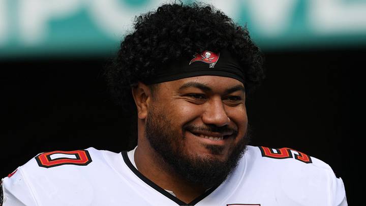 Dec 28, 2025; Miami Gardens, Florida, USA; Tampa Bay Buccaneers defensive tackle Vita Vea (50) walks out for player introductions prior to a game against the Miami Dolphins at Hard Rock Stadium. Mandatory Credit: Nathan Ray Seebeck-Imagn Images
