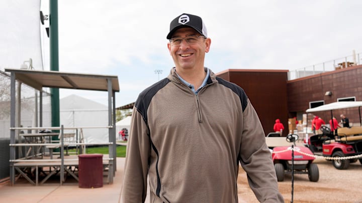 Reds president of baseball operations Nick Krall walks between fields at the Cincinnati Reds Player Development Complex in Goodyear, Ariz., on Wednesday, Feb. 12, 2025. Reds president of baseball operations Nick Krall walks between fields at the Cincinnati Reds Player Development Complex in Goodyear, Ariz., on Wednesday, Feb. 12, 2025.