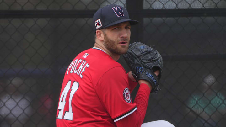 Feb 18, 2025; West Palm Beach, FL, USA;  Washington Nationals pitcher Colin Poche (41) warms-up before pitching live batting practice at spring training.