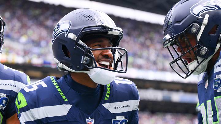 Sep 21, 2025; Seattle, Washington, USA; Seattle Seahawks wide receiver Tory Horton (15) celebrates after scoring a 95-yard punt return for a touchdown against the New Orleans Saints during the first quarter at Lumen Field.