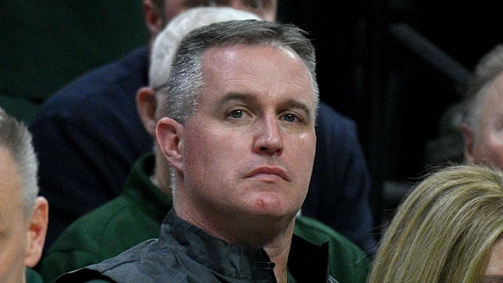 Dec 2, 2025; East Lansing, Michigan, USA;  Michigan State head football coach Pat Fitzgerald watches the Spartans defeat the Iowa Hawkeyes at Jack Breslin Student Events Center.