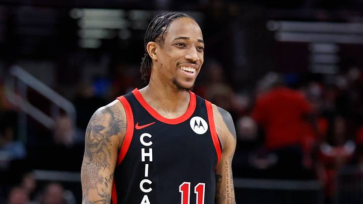 Jan 30, 2024; Chicago, Illinois, USA; Chicago Bulls forward DeMar DeRozan (11) smiles as he walks on the court during the first half of a basketball game against the Toronto Raptors at United Center. Mandatory Credit: Kamil Krzaczynski-USA TODAY Sports