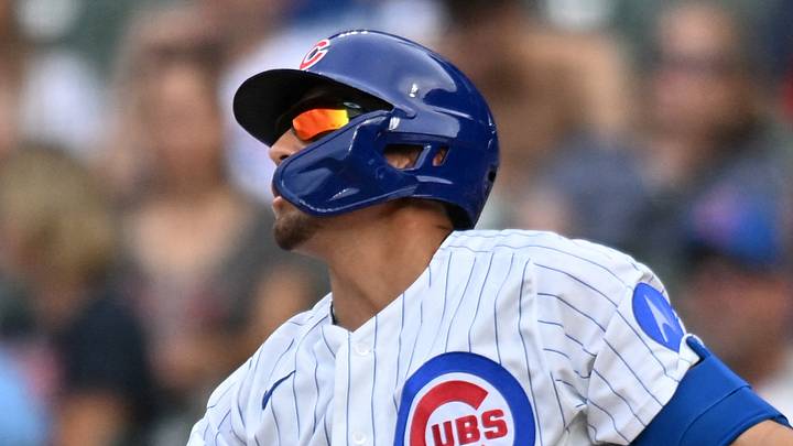 Aug 16, 2026; Chicago, Illinois, USA; Chicago Cubs pinch-hitter Tyrone Taylor (55) hits a sacrifice RBI against the St. Louis Cardinals during the eighth inning at Wrigley Field. Mandatory Credit: Patrick Gorski-Imagn Images