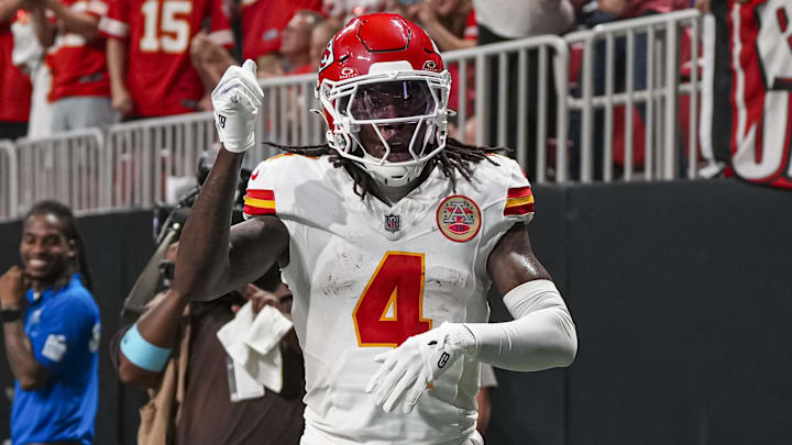 Sep 22, 2024; Atlanta, Georgia, USA; Kansas City Chiefs wide receiver Rashee Rice (4) reacts after scoring a touchdown against the Atlanta Falcons during the first half at Mercedes-Benz Stadium. Mandatory Credit: Dale Zanine-Imagn Images