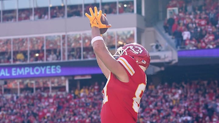 Kansas City Chiefs tight end Travis Kelce (87) catches a touchdown as Cincinnati Bengals free safety Jessie Bates (30) defends in the second quarter during the AFC championship NFL football game on Jan. 30, 2022, at GEHA Field at Arrowhead Stadium in Kansas City. Kansas City Chiefs tight end Travis Kelce (87) catches a touchdown as Cincinnati Bengals free safety Jessie Bates (30) defends in the second quarter during the AFC championship NFL football game on Jan. 30, 2022, at GEHA Field at Arrowhead Stadium in Kansas City.