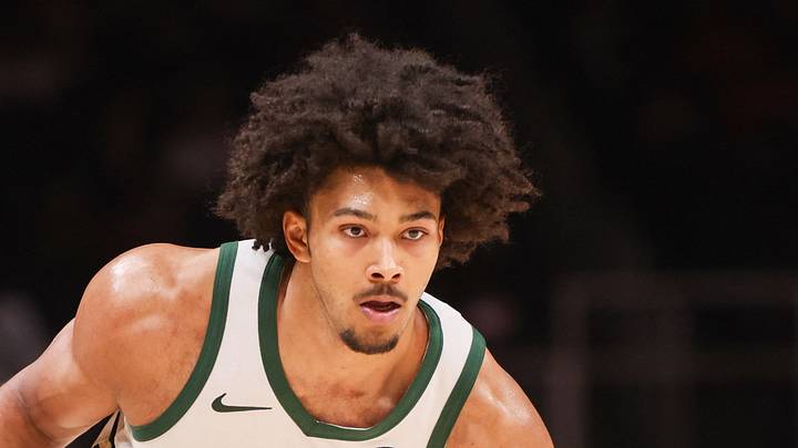Milwaukee Bucks center Jericho Sims (00) handles the ball against the Atlanta Hawks in the second quarter at State Farm Arena on March 14, 2026.