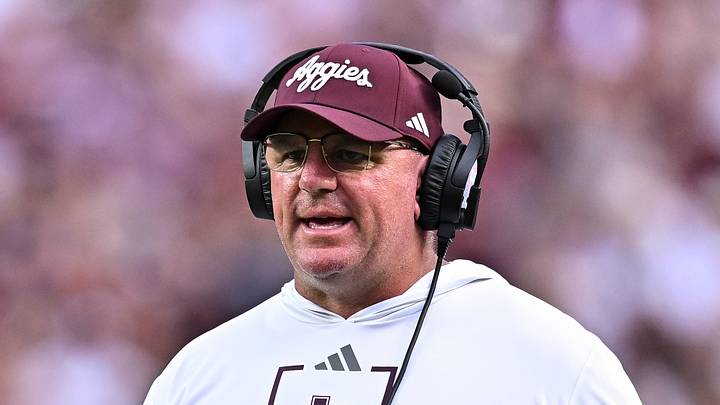 Texas A&M Aggies head coach Mike Elko walks onto the field during a time-out in the first quarter against the Missouri State Bears at Kyle Field. Texas A&M Aggies head coach Mike Elko walks onto the field during a time-out in the first quarter against the Missouri State Bears at Kyle Field.