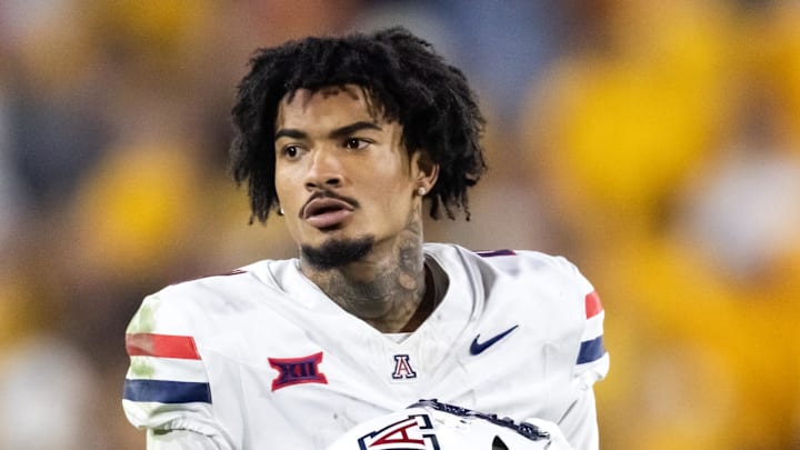 Nov 28, 2025; Tempe, Arizona, USA; Arizona Wildcats wide receiver Kris Hutson (4) against the Arizona State Sun Devils during the 99th Territorial Cup at Mountain America Stadium. Mandatory Credit: Mark J. Rebilas-Imagn Images Nov 28, 2025; Tempe, Arizona, USA; Arizona Wildcats wide receiver Kris Hutson (4) against the Arizona State Sun Devils during the 99th Territorial Cup at Mountain America Stadium. Mandatory Credit: Mark J. Rebilas-Imagn Images
