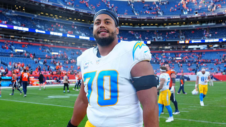 Oct 13, 2024; Denver, Colorado, USA; Los Angeles Chargers offensive tackle Rashawn Slater (70) following the win over the Denver Broncos at Empower Field at Mile High. Mandatory Credit: Ron Chenoy-Imagn Images