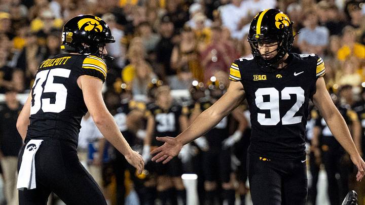 Iowa Hawkeye kicker Caden Buhr (92) high-fives Iowa Hawkeyes punter Tanner Philpott (35) after making a field goal attempt during the Cy-Hawk football game against Iowa State Sept. 12, 2026 at Kinnick Stadium in Iowa City, Iowa. Iowa Hawkeye kicker Caden Buhr (92) high-fives Iowa Hawkeyes punter Tanner Philpott (35) after making a field goal attempt during the Cy-Hawk football game against Iowa State Sept. 12, 2026 at Kinnick Stadium in Iowa City, Iowa.